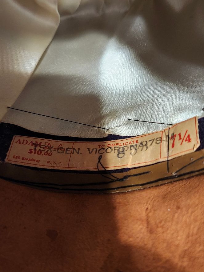 Adam hat ID tag.jpg